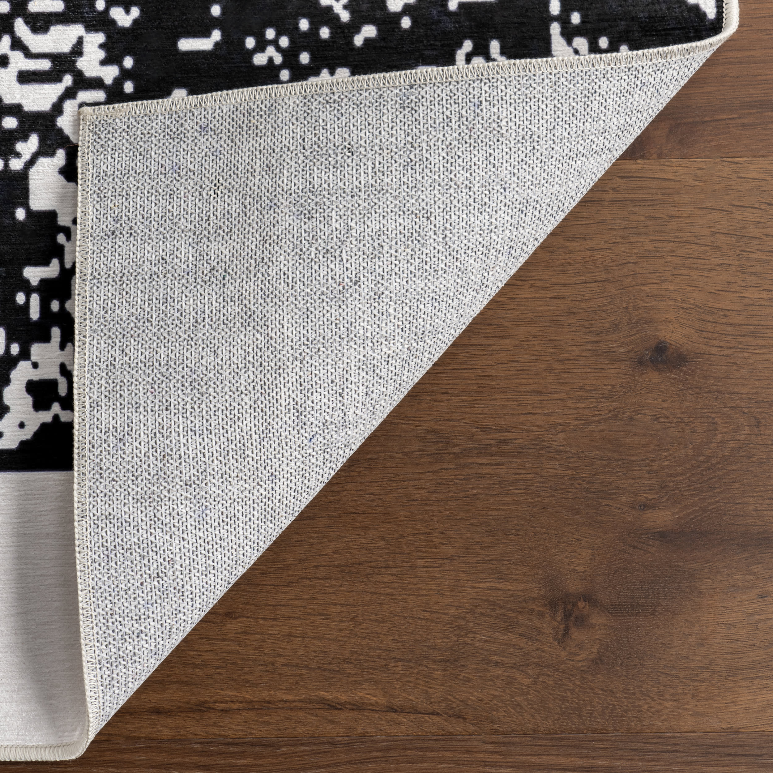 Casey Simple Serpent Spill Proof Washable Rug | Black - Image 7
