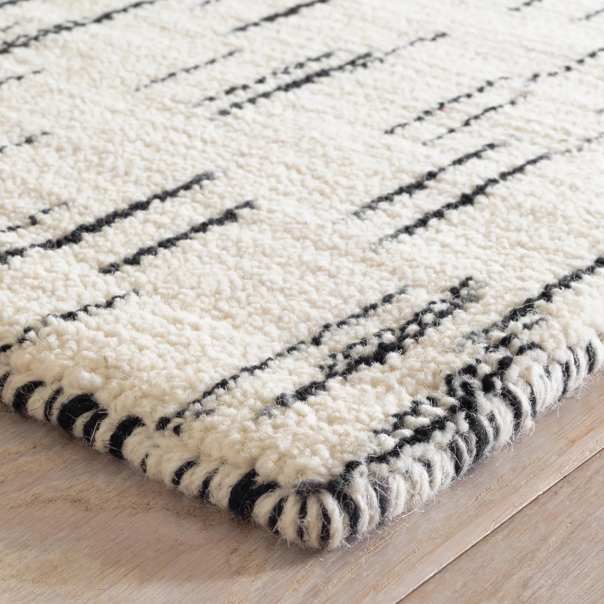 Ozzie Hand Loom Knotted Wool Rug | Black/White - Image 4